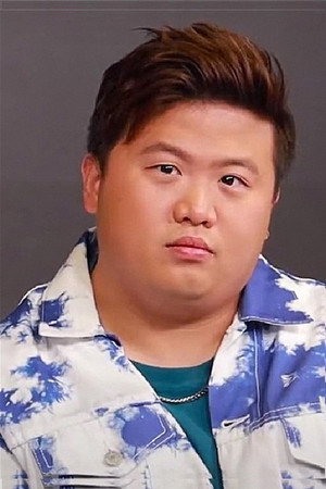 梁業