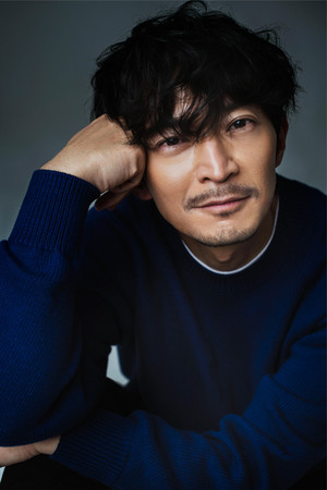 津田健次郎 profil kép