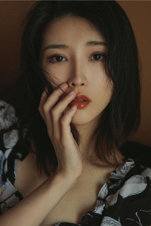 Wang Xi profil kép
