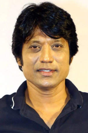 S. J. Suryah profil kép