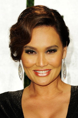 Tia Carrere profil kép